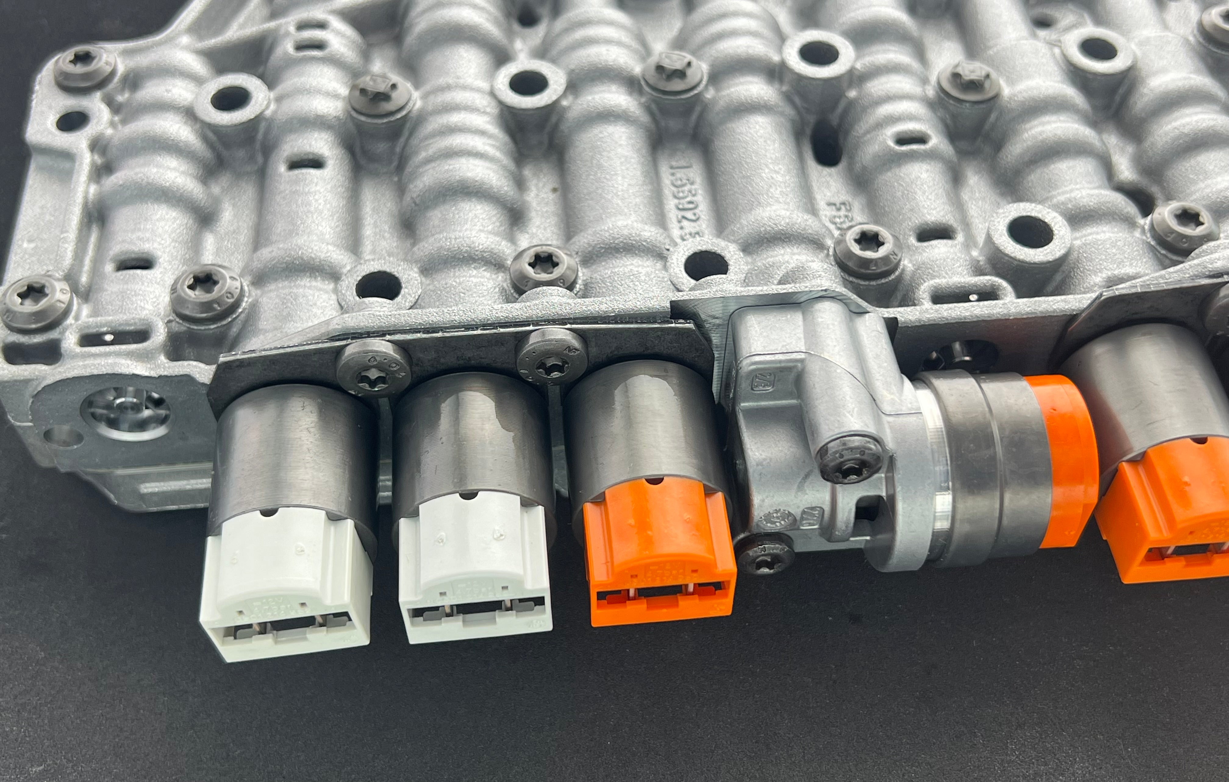 Porsche PDK transmission valve body 9G131701510 Rebuilt Porsche PDK Transmission Valve Body 9G131701535 solenoid clutch pressure shift white black orange germany 911 boxster boxtercayman Carrera, Carrera 4, Carrera 4 Black Edition, Carrera 4 GTS, Carrera 4S, Carrera Black Edition, Carrera GTS, Carrera S, GT3, GT3 RS, R, Targa 4, Targa 4 GTS, Targa 4S 718 
718 CAYMAN 987 991  9G131701535
9G131701500 9G131701505 9G131701510 91831701500